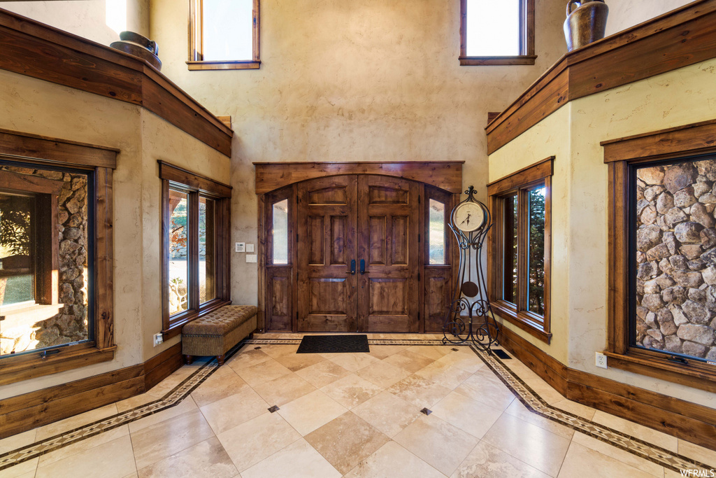 entryway with tile floors and natural light