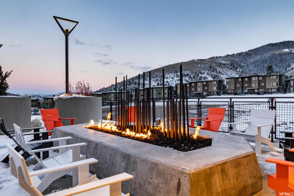 view of terrace with fire pit
