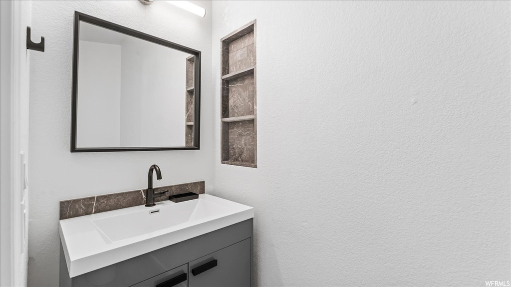 Bathroom featuring vanity