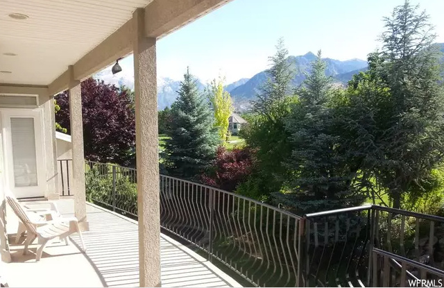 balcony featuring a mountain view