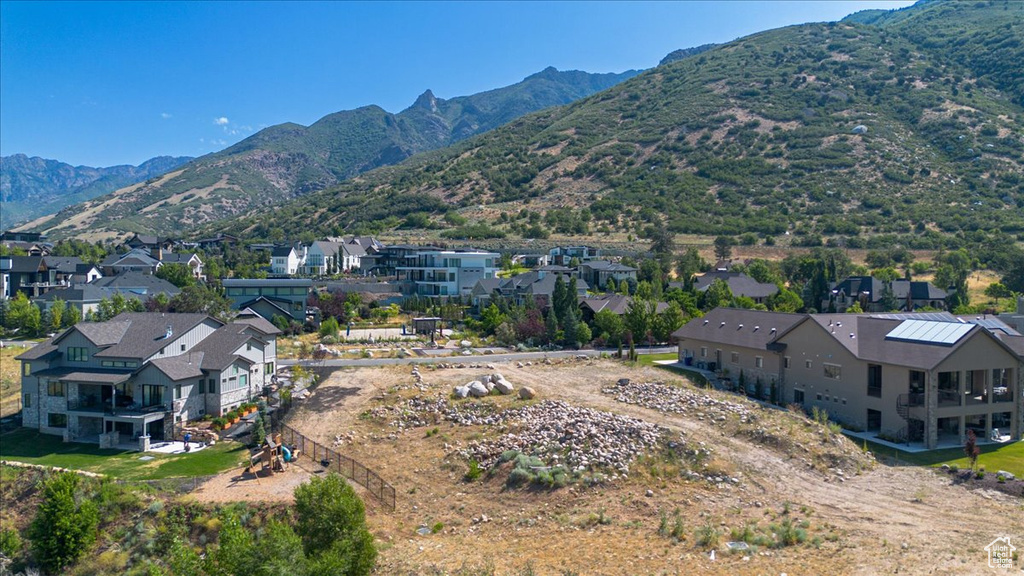 Mountain view featuring nearby suburban area