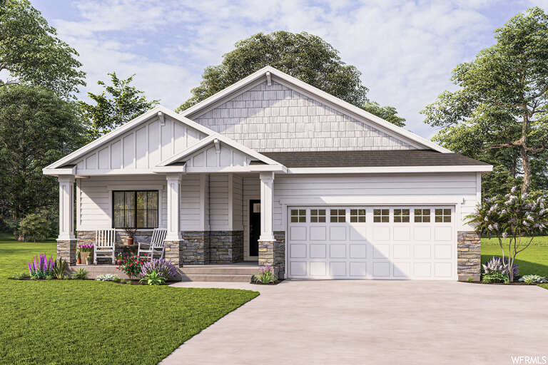 craftsman-style home with a front yard