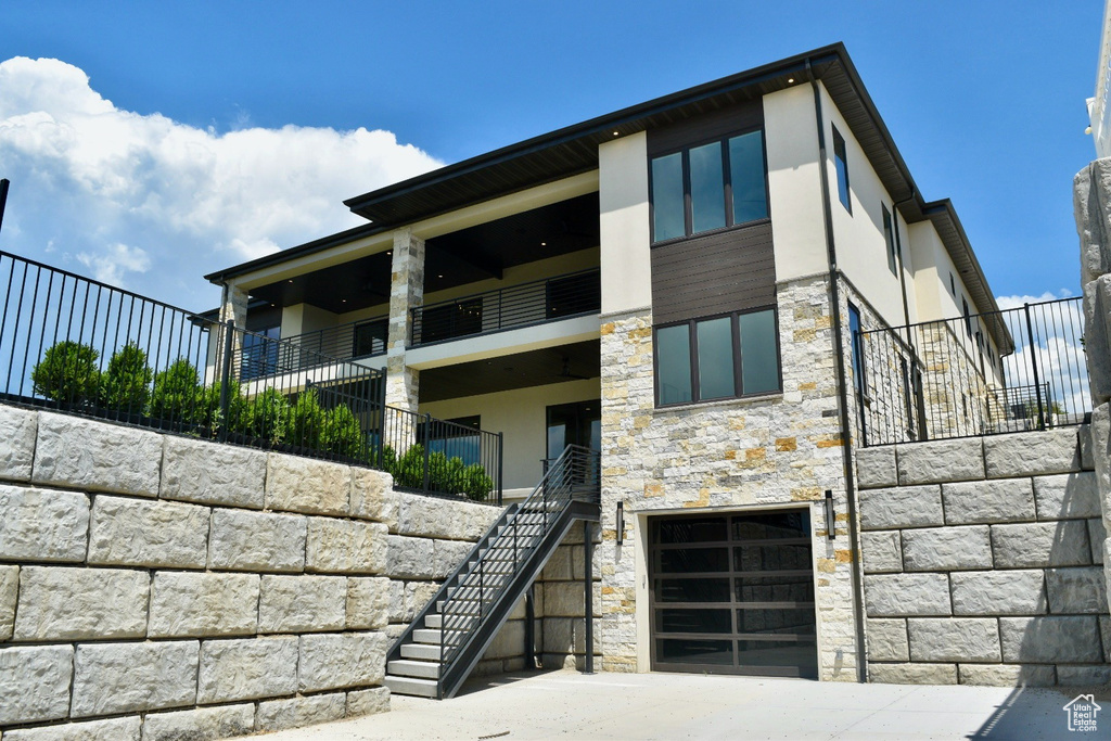 View of property featuring a garage