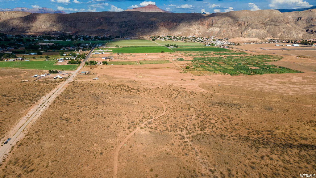 view of mountain feature featuring a lawn