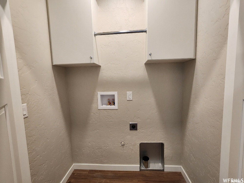 Washroom featuring hardwood floors