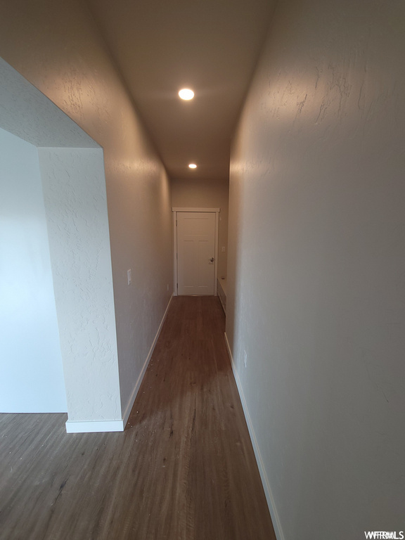 Corridor with wood-type flooring