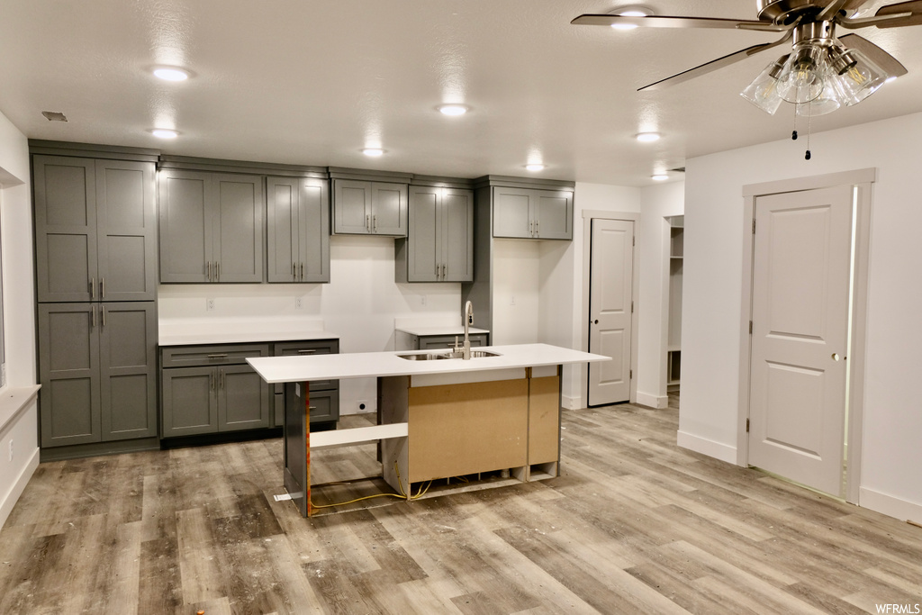 kitchen featuring light countertops and light hardwood flooring
