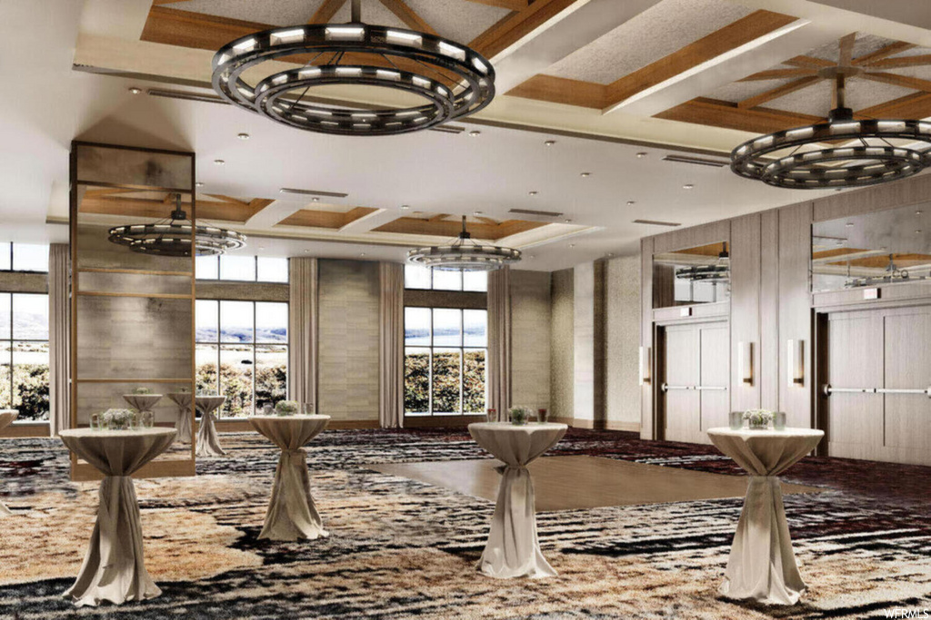 lobby with natural light, a notable chandelier, coffered ceiling, and beamed ceiling