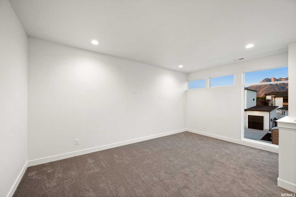 Interior space featuring light carpet