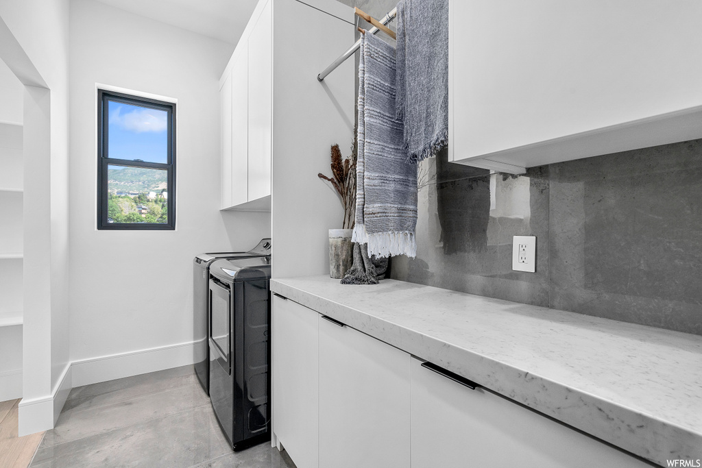 laundry area featuring natural light