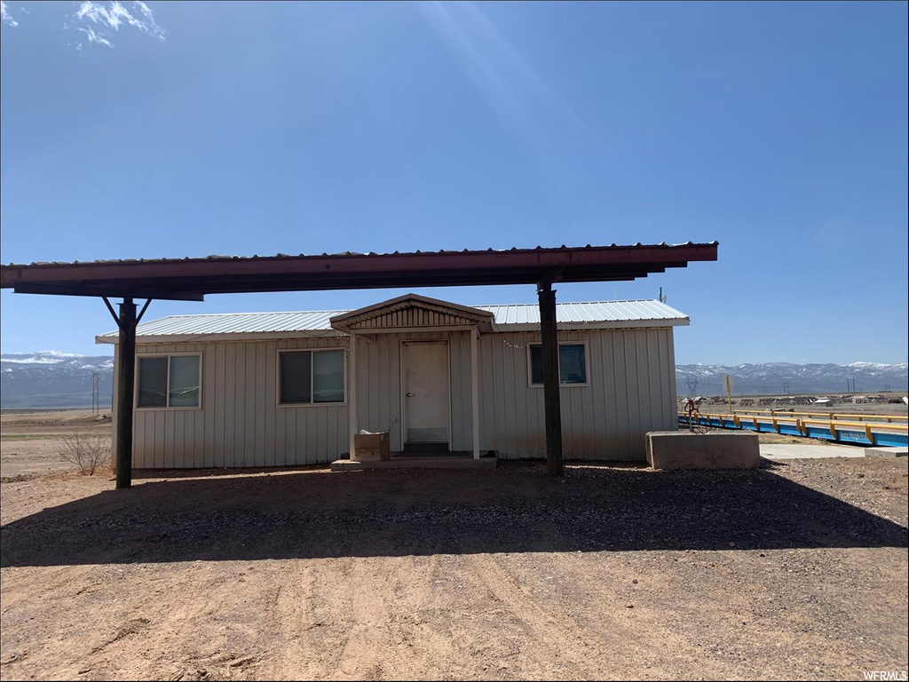 exterior space featuring a mountain view