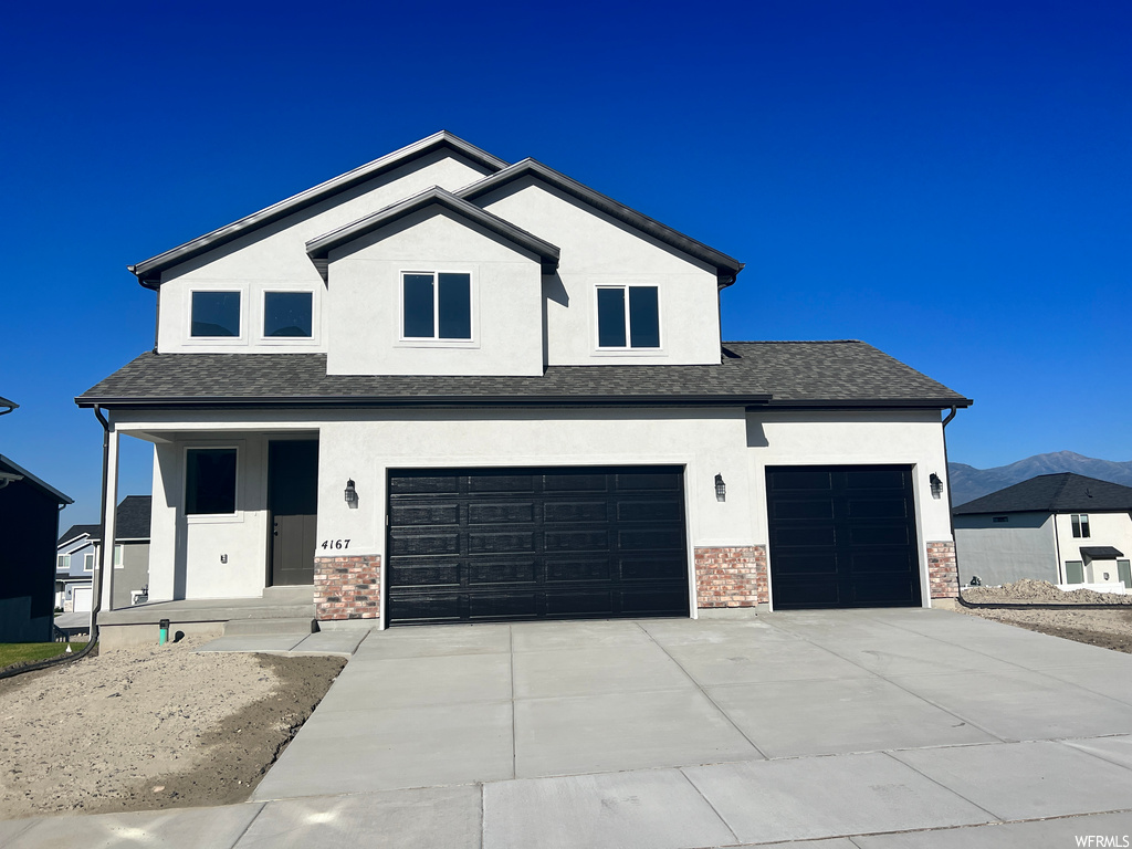 View of front of home with garage