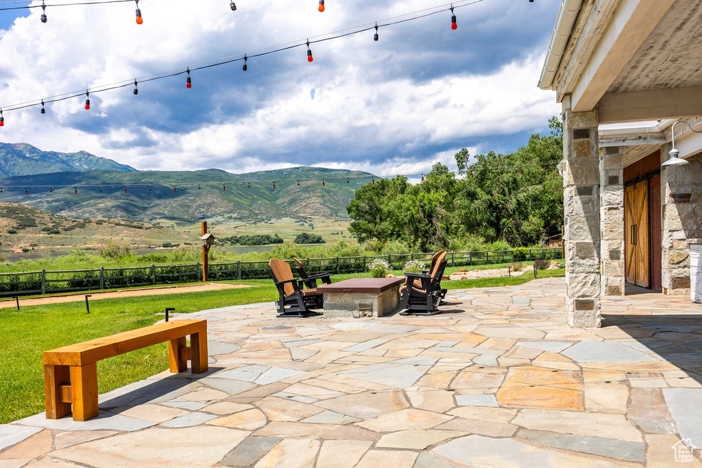 View of patio featuring a mountain view