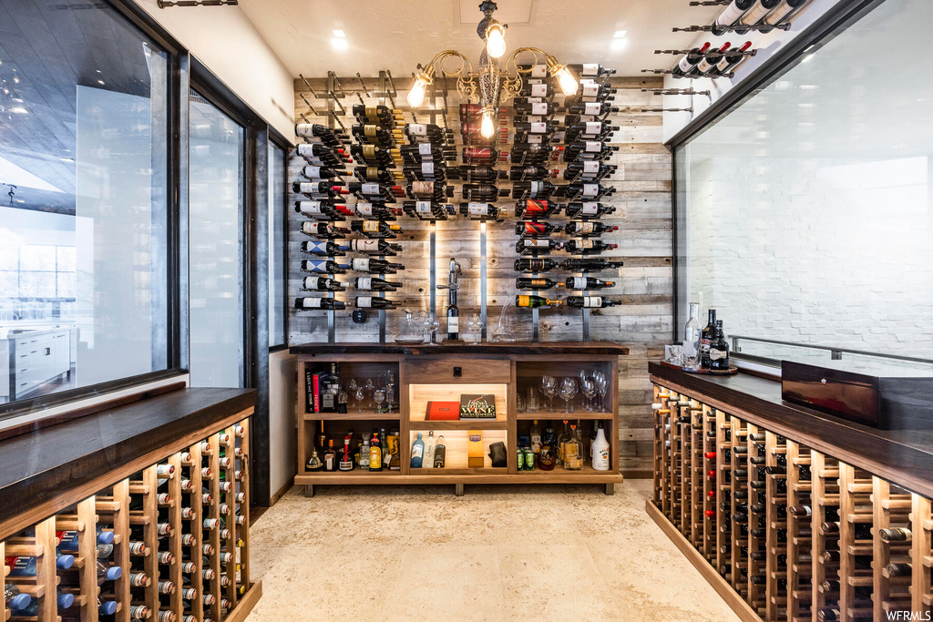 Wine cellar featuring bar area