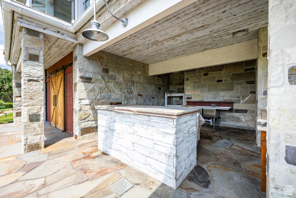 View of patio / terrace with a fireplace