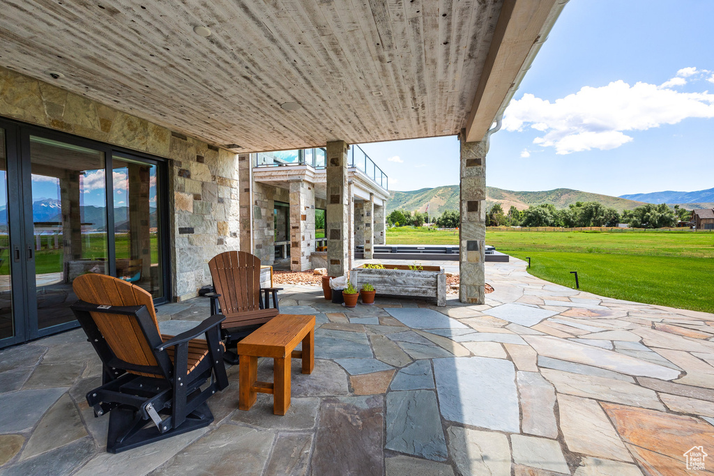 View of patio featuring a mountain view and french doors