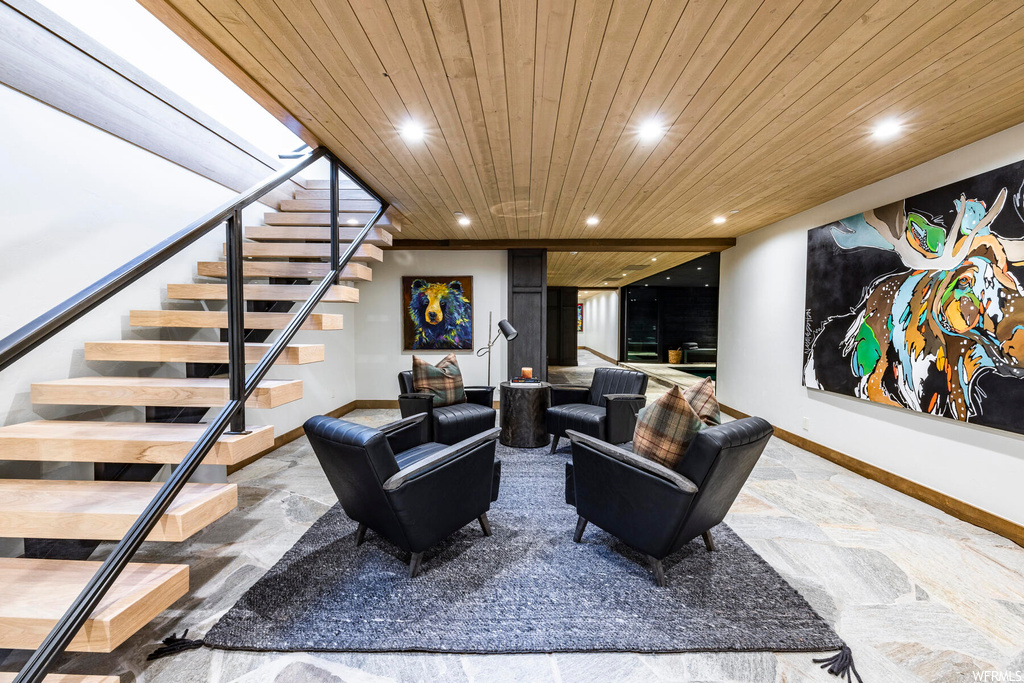 Living room featuring wooden ceiling