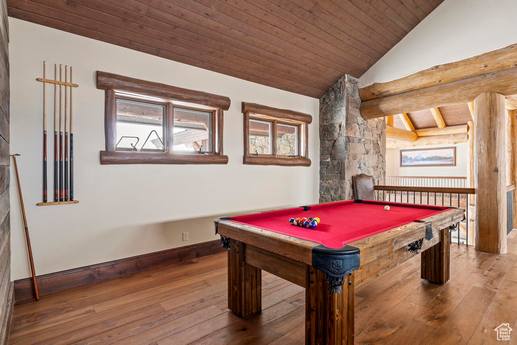 Rec room featuring wood ceiling, hardwood / wood-style floors, pool table, and vaulted ceiling with beams