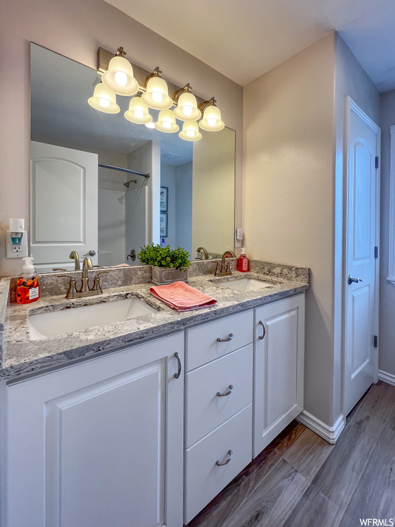 Bathroom with double vanity and dual mirrors