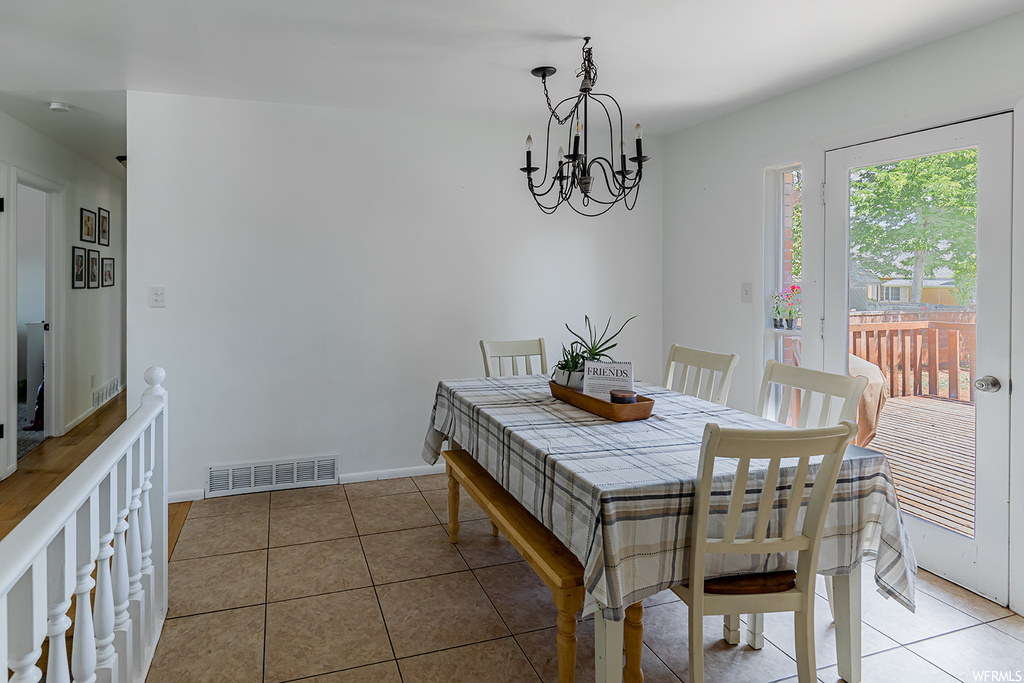 Tiled dining room with natural light