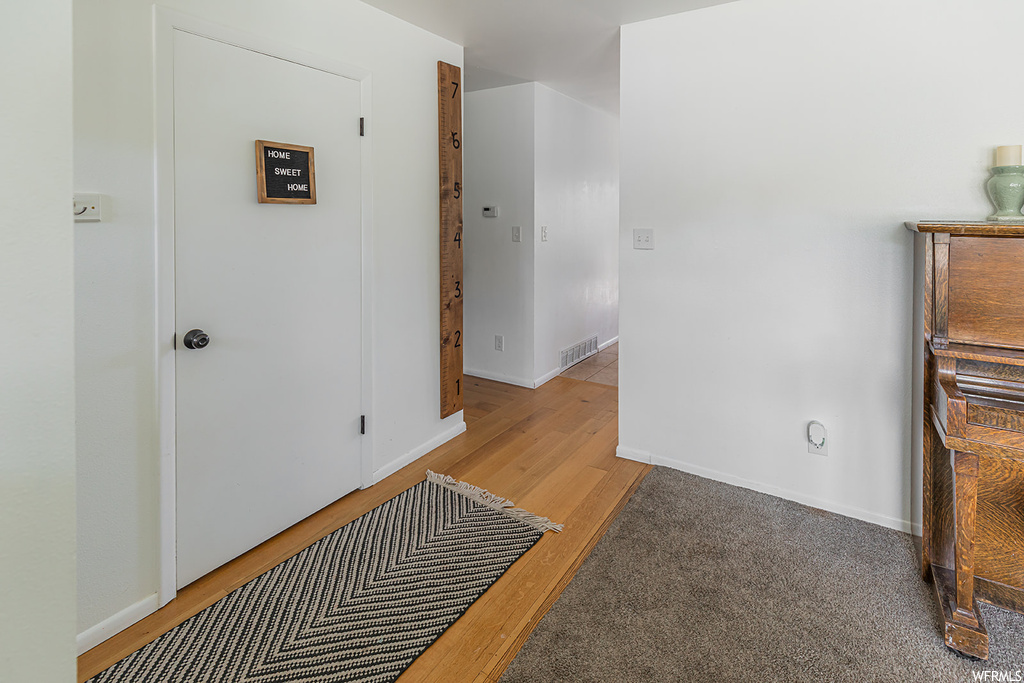 Hallway with carpet