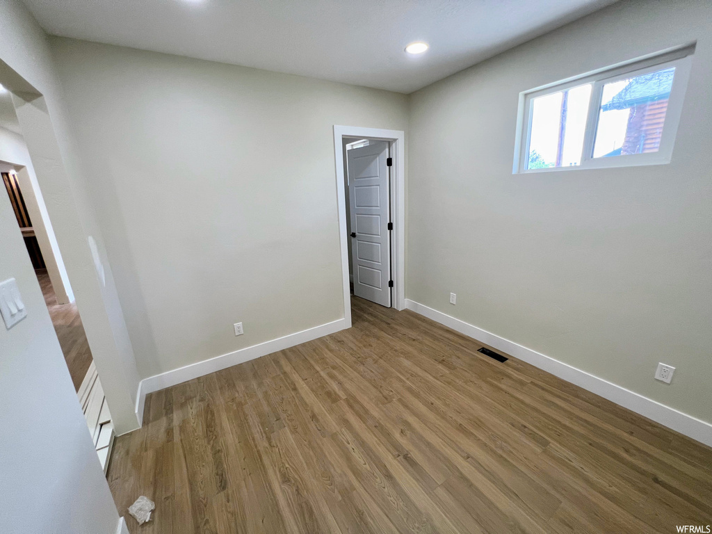 View of hardwood floored empty room