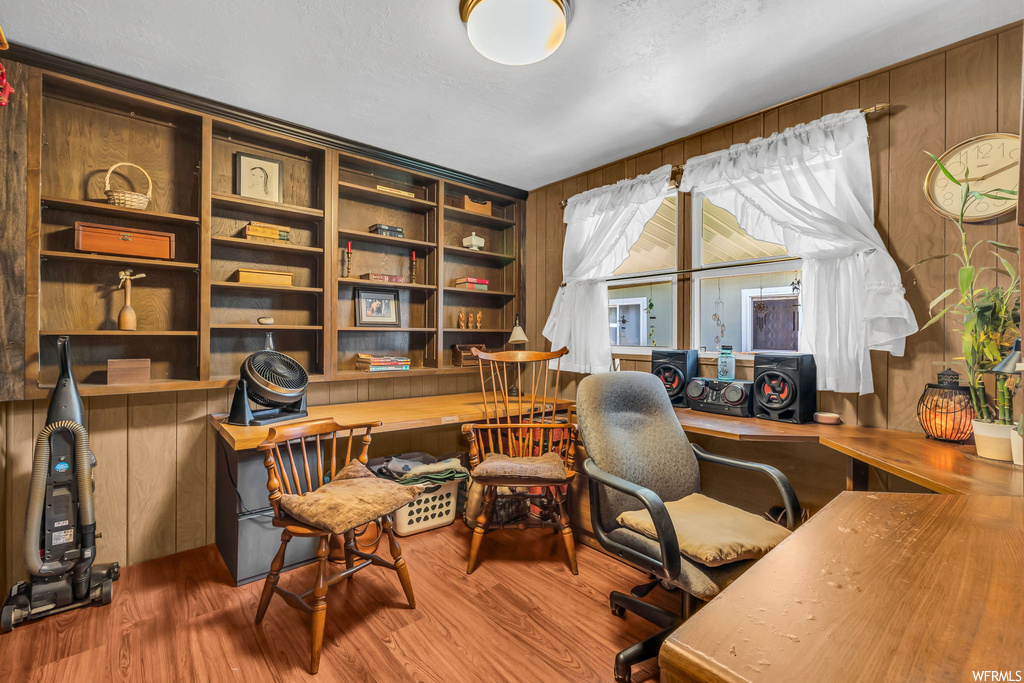 View of wood floored home office