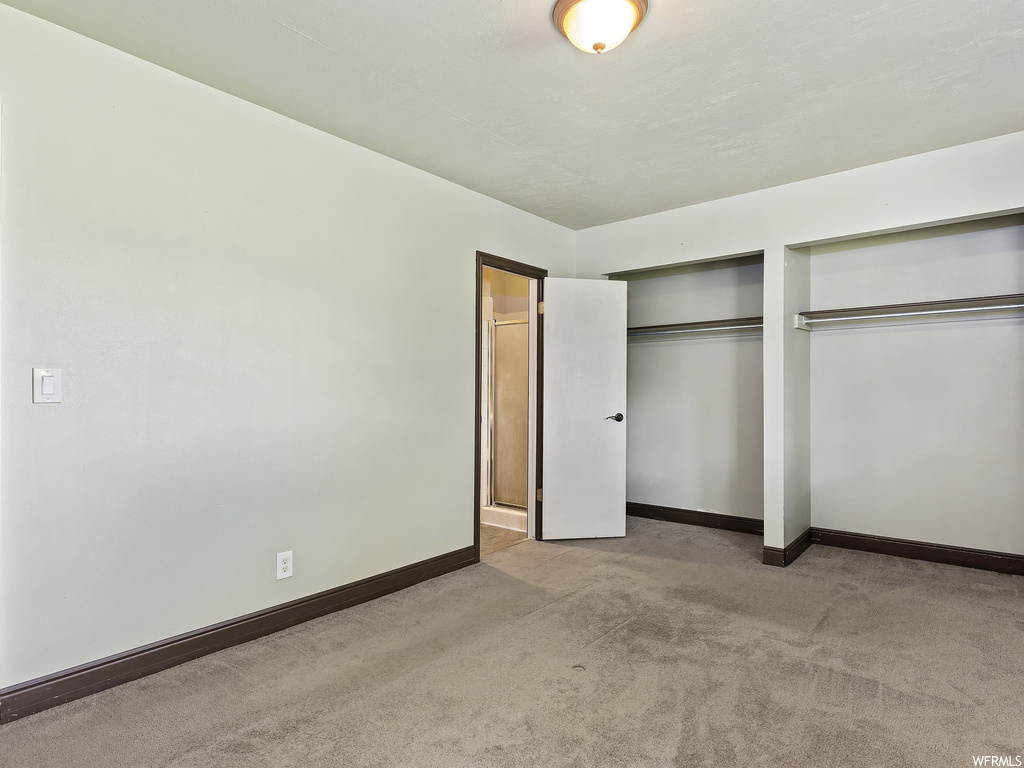 Bedroom with carpet