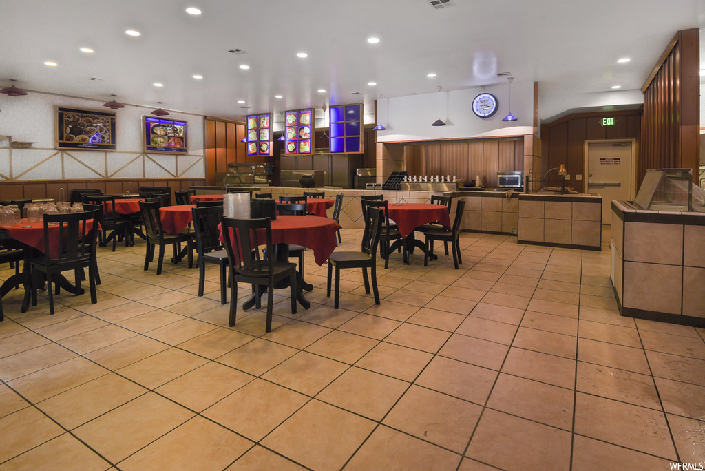 Dining space featuring tile floors