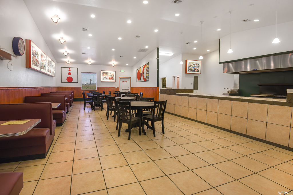 Dining space with tile flooring