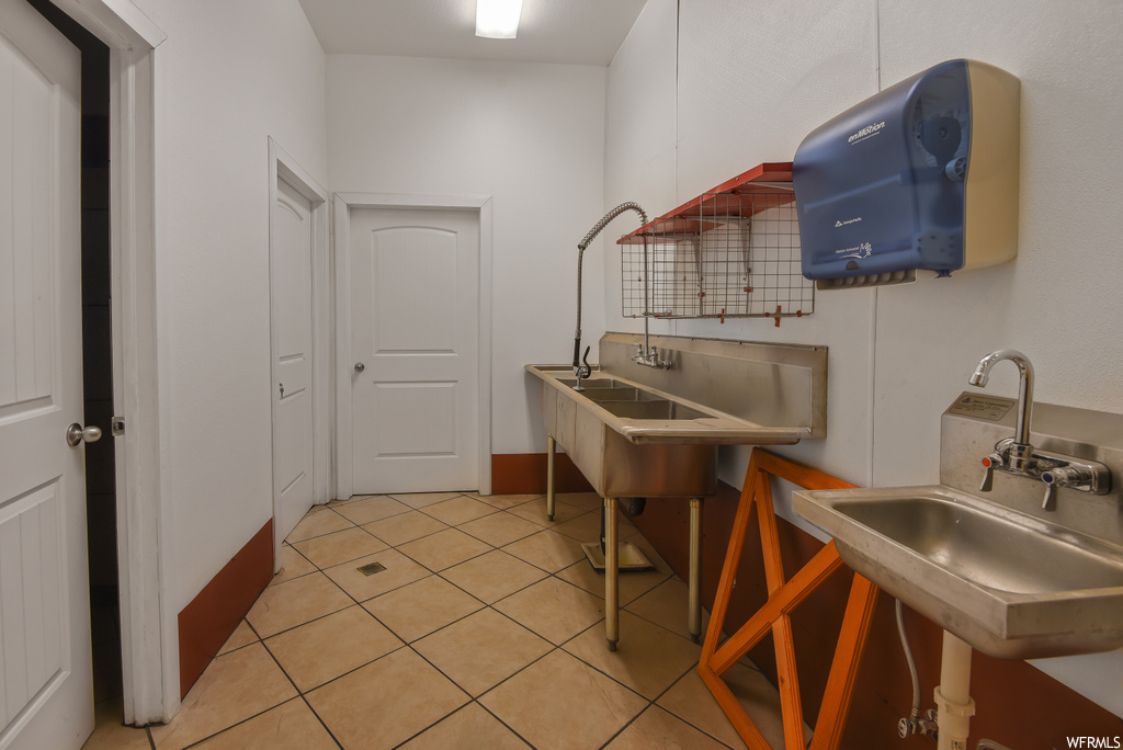Kitchen with light tile floors