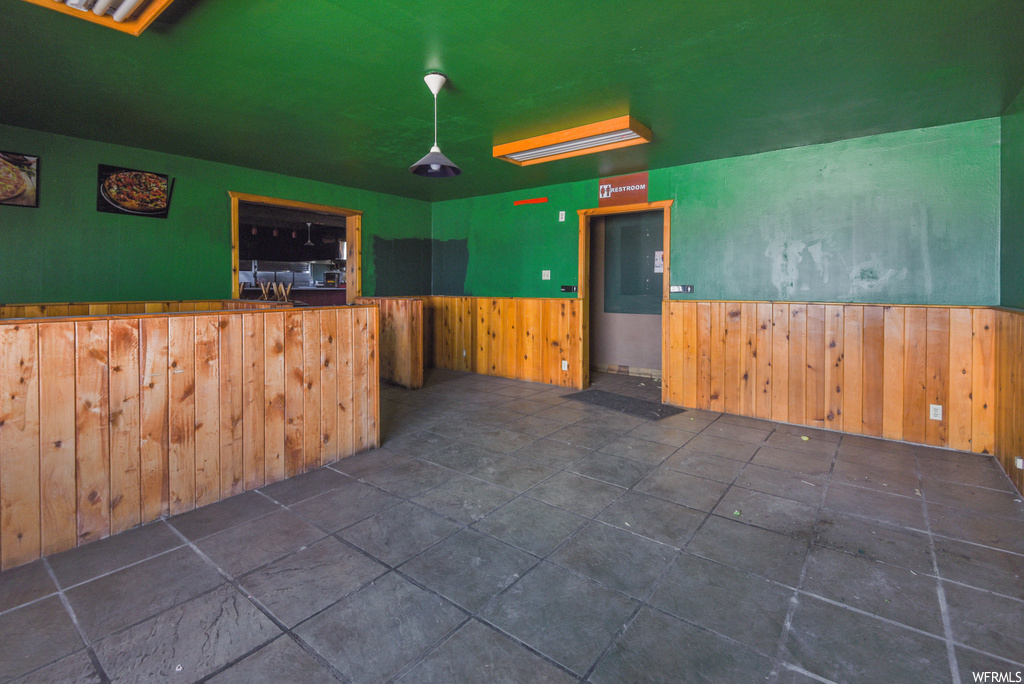 Spare room featuring tile flooring