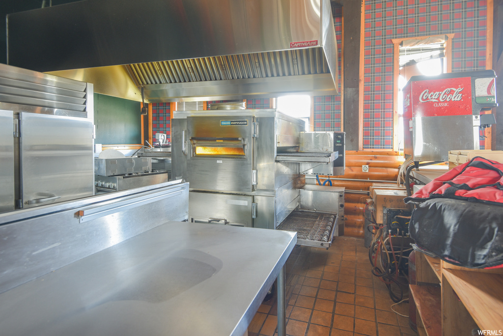 Kitchen featuring tile flooring