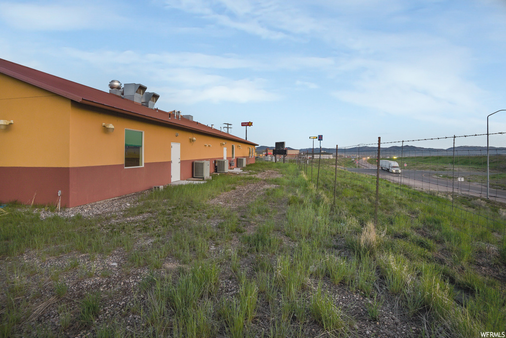 Yard featuring central AC