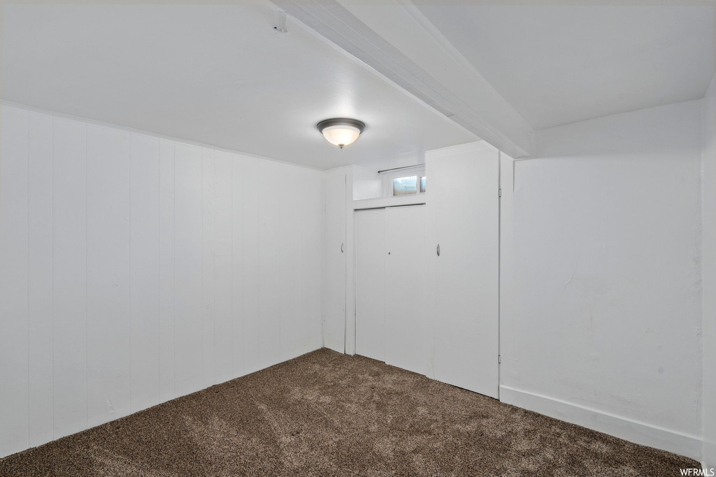 Basement with carpet