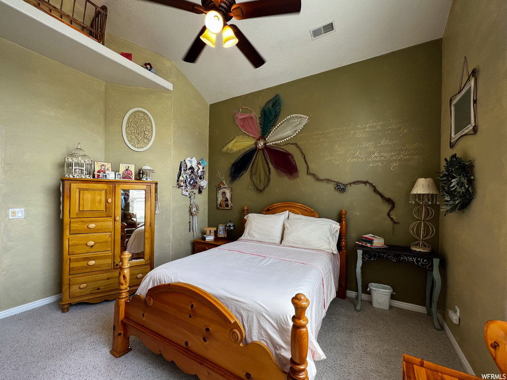 Bedroom featuring carpet and a ceiling fan