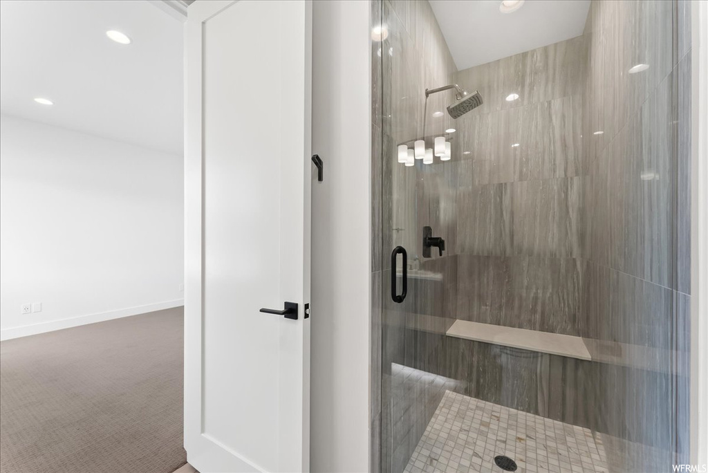 Bathroom with enclosed shower