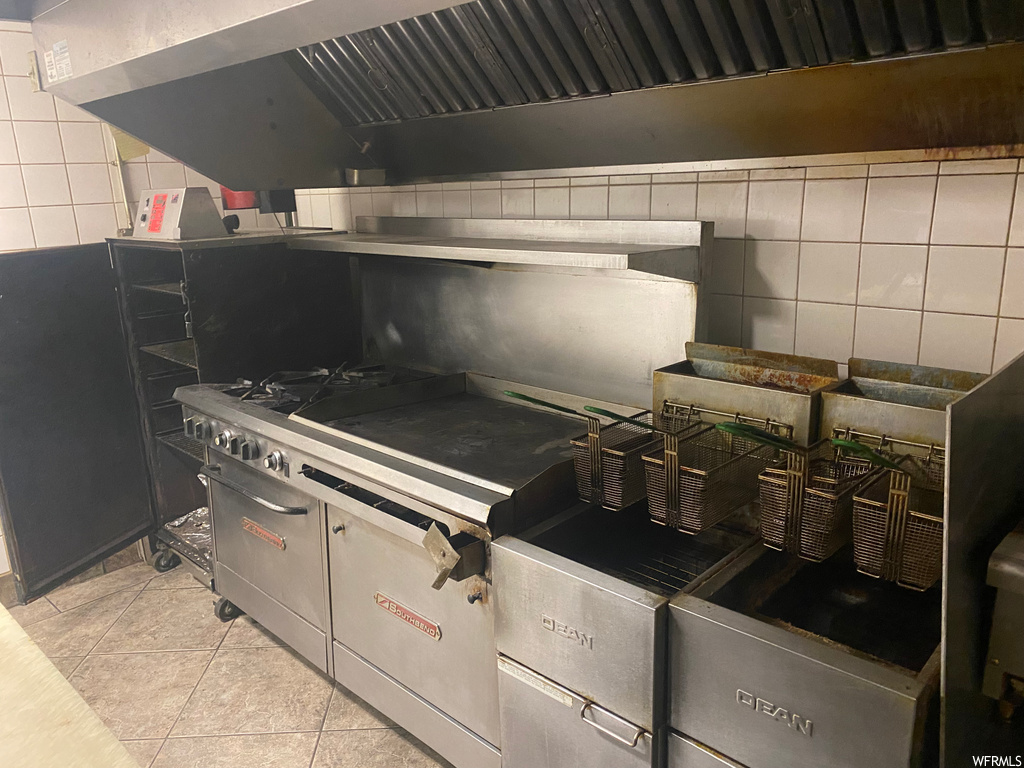 Kitchen with light tile floors