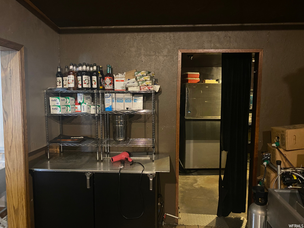 Interior space featuring dark brown cabinets