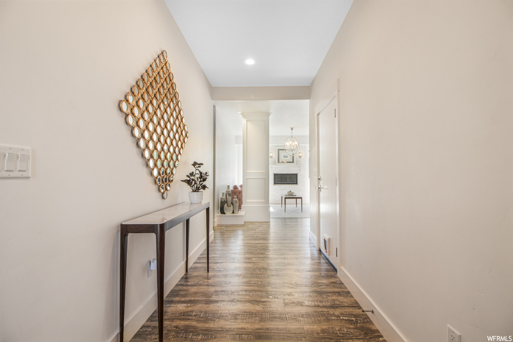 Hallway featuring hardwood flooring