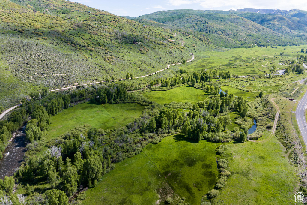 Birds eye view of property featuring a mountain view