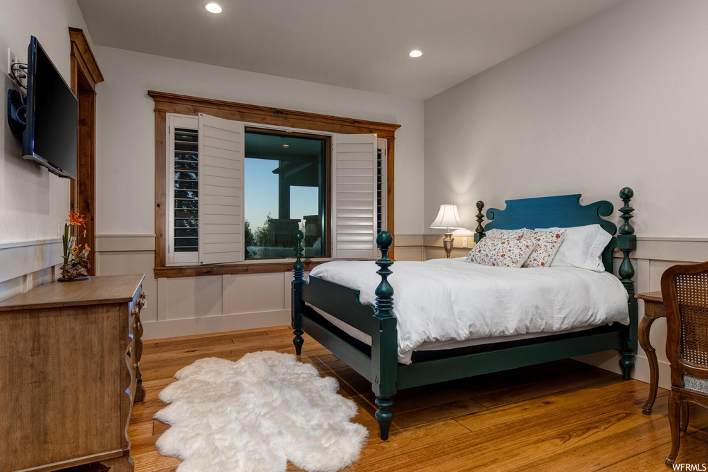 Bedroom featuring light hardwood floors