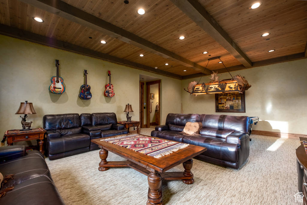 Carpeted living room with wood ceiling, baseboards, beamed ceiling, and recessed lighting