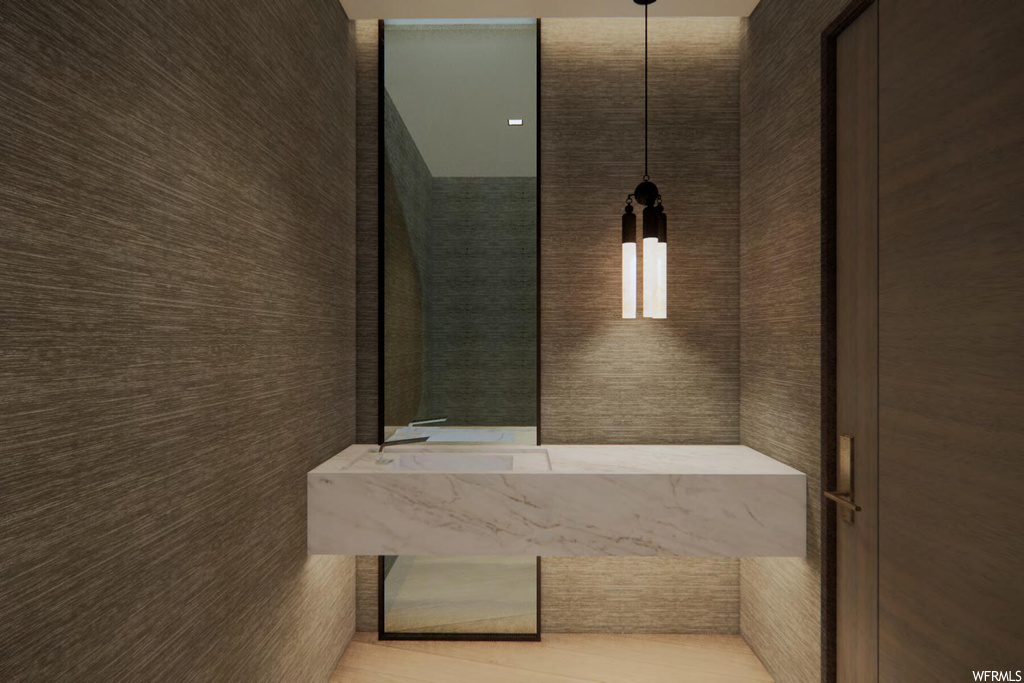Bathroom featuring tile walls