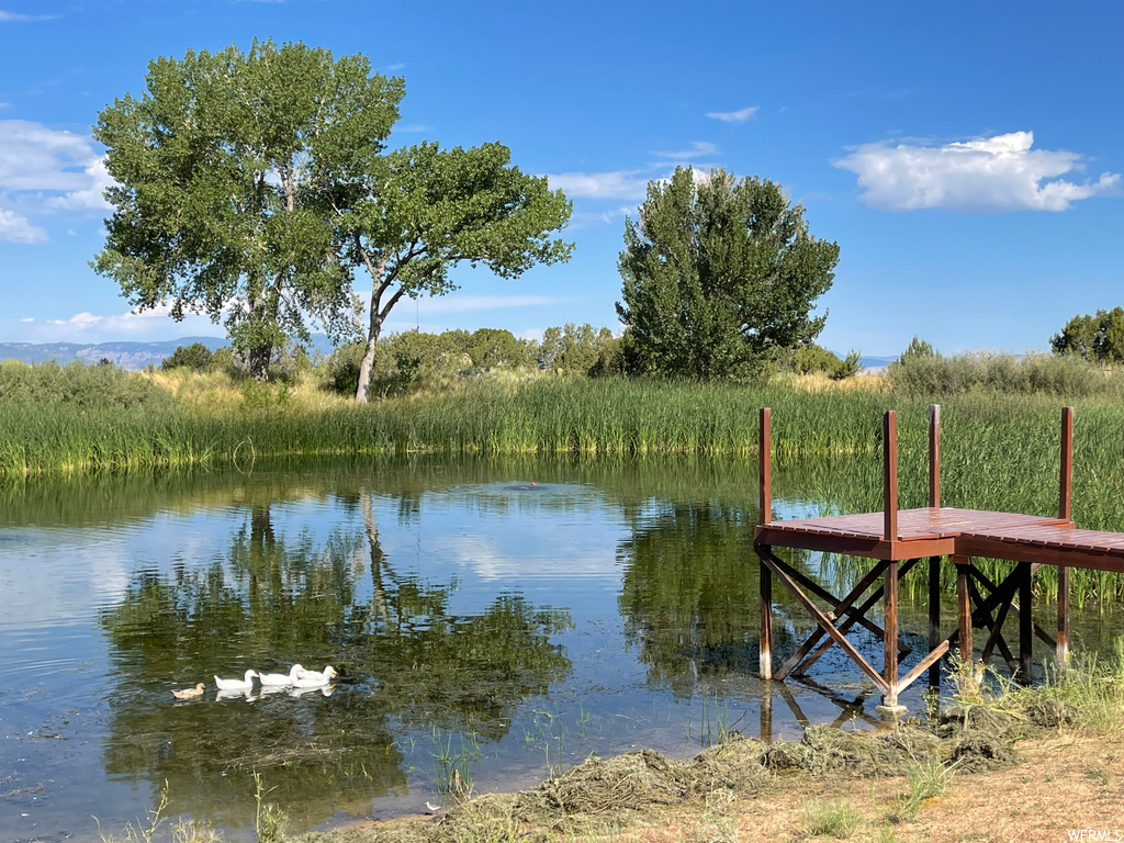 View of dock featuring a water view