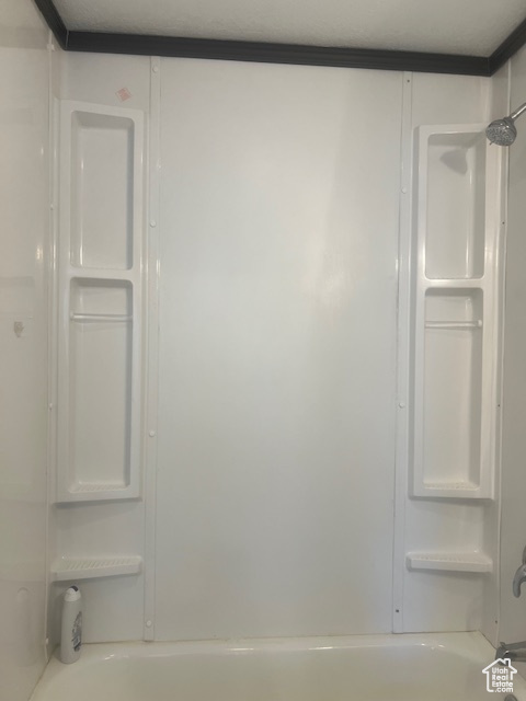 Bathroom featuring bathtub / shower combination