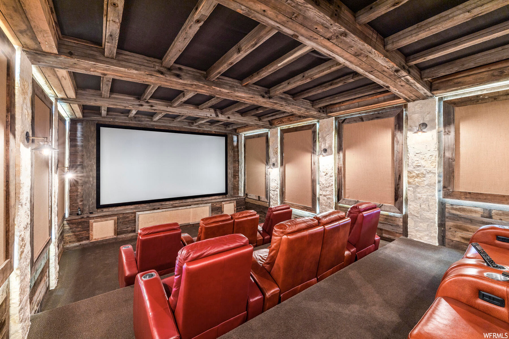 Home theater room featuring carpet