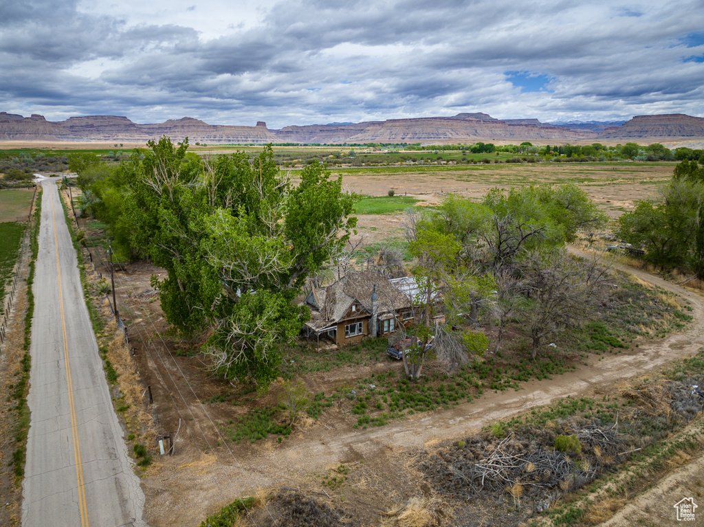 Property view of mountains featuring a rural view