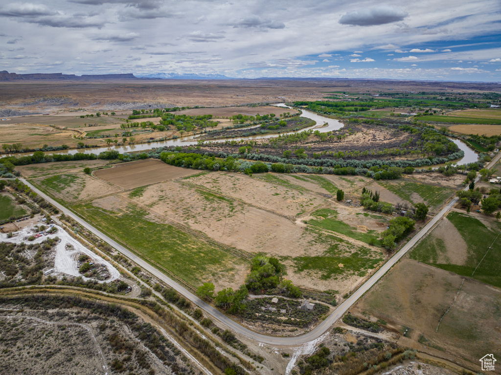 Birds eye view of property featuring a rural view