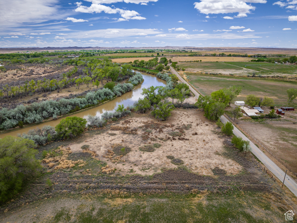 Drone / aerial view with a rural view and a water view